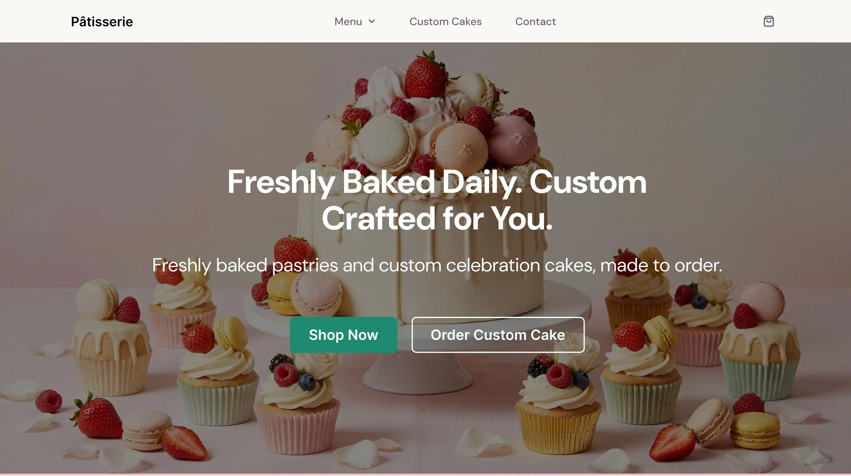 Pâtisserie's homepage hero: Freshly Baked Daily. Custom Crafted for You., with Shop Now and Order Custom Cake buttons over a cake topped with macarons and berries